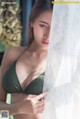 See the glamorous body of the beautiful Pichana Yoosuk in a halter bikini (19 pictures)