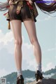 A woman in a short skirt and high heels standing on a rock.